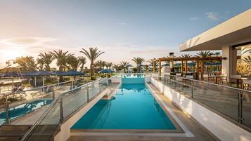 3 outdoor pools, open 10:00 AM to 7:00 PM, pool umbrellas, sun loungers