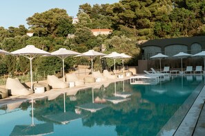 Outdoor pool, pool umbrellas, pool loungers