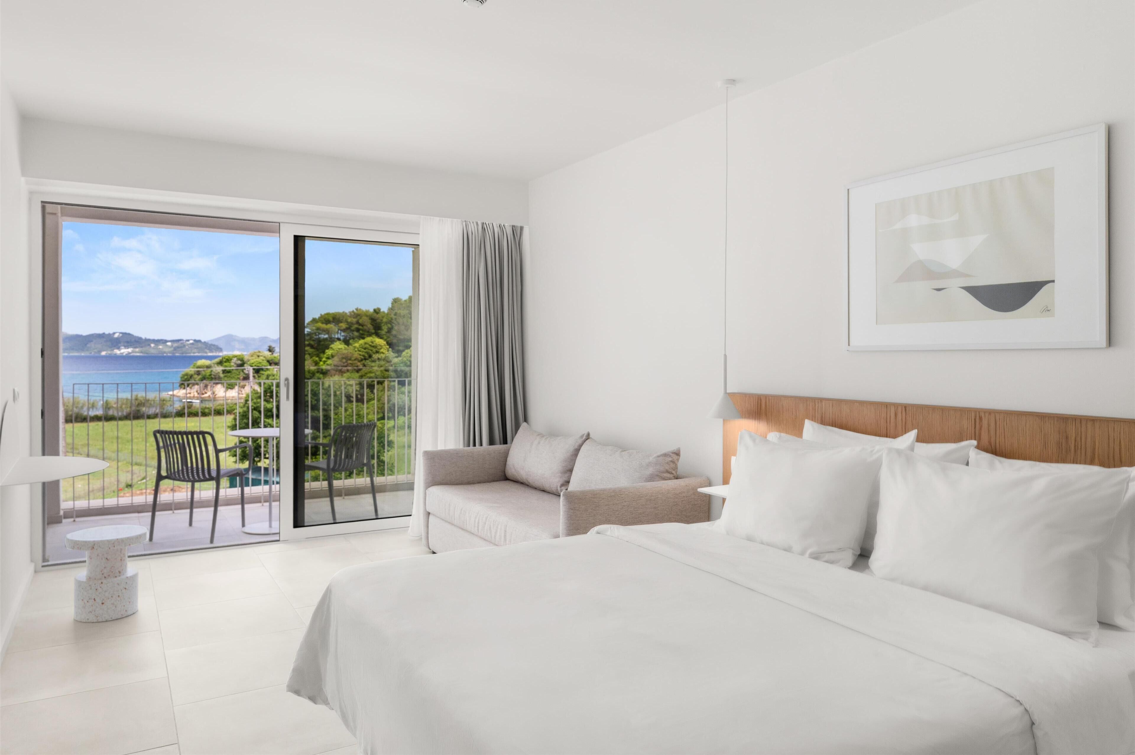 Camera Premium, balcone, vista mare | Biancheria da letto di alta qualità, minibar, cassaforte in camera