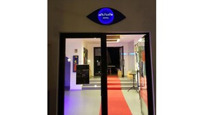 A hotel entrance with a red carpet leading inside. - Kalamar Hotel (Kas)