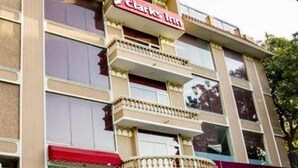 A multi-story hotel with a prominent 'Clarics Inn' sign. - Clarks Inn Nehru Place (New Delhi)