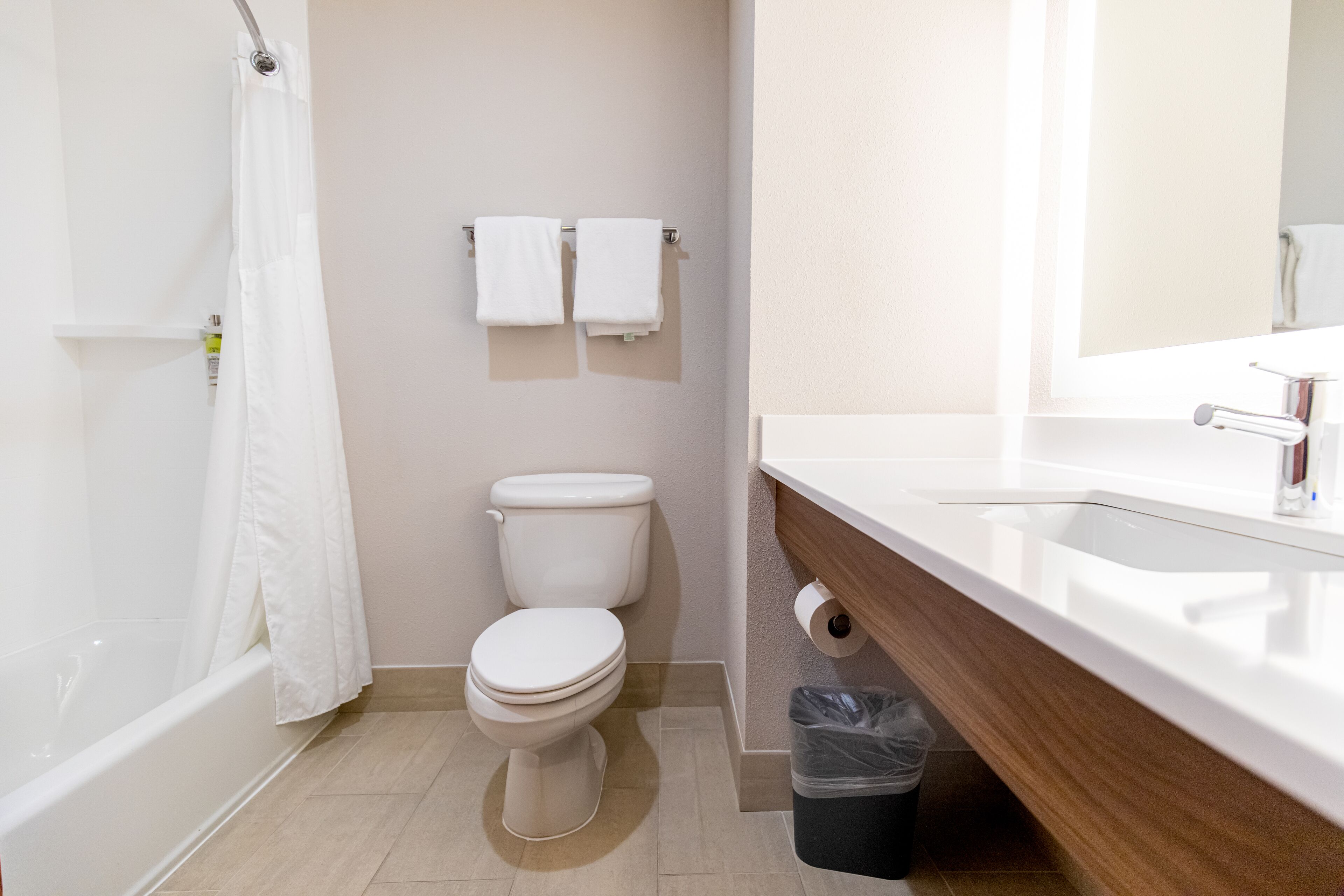 combined shower/bathtub, free toiletries, hair dryer, towels