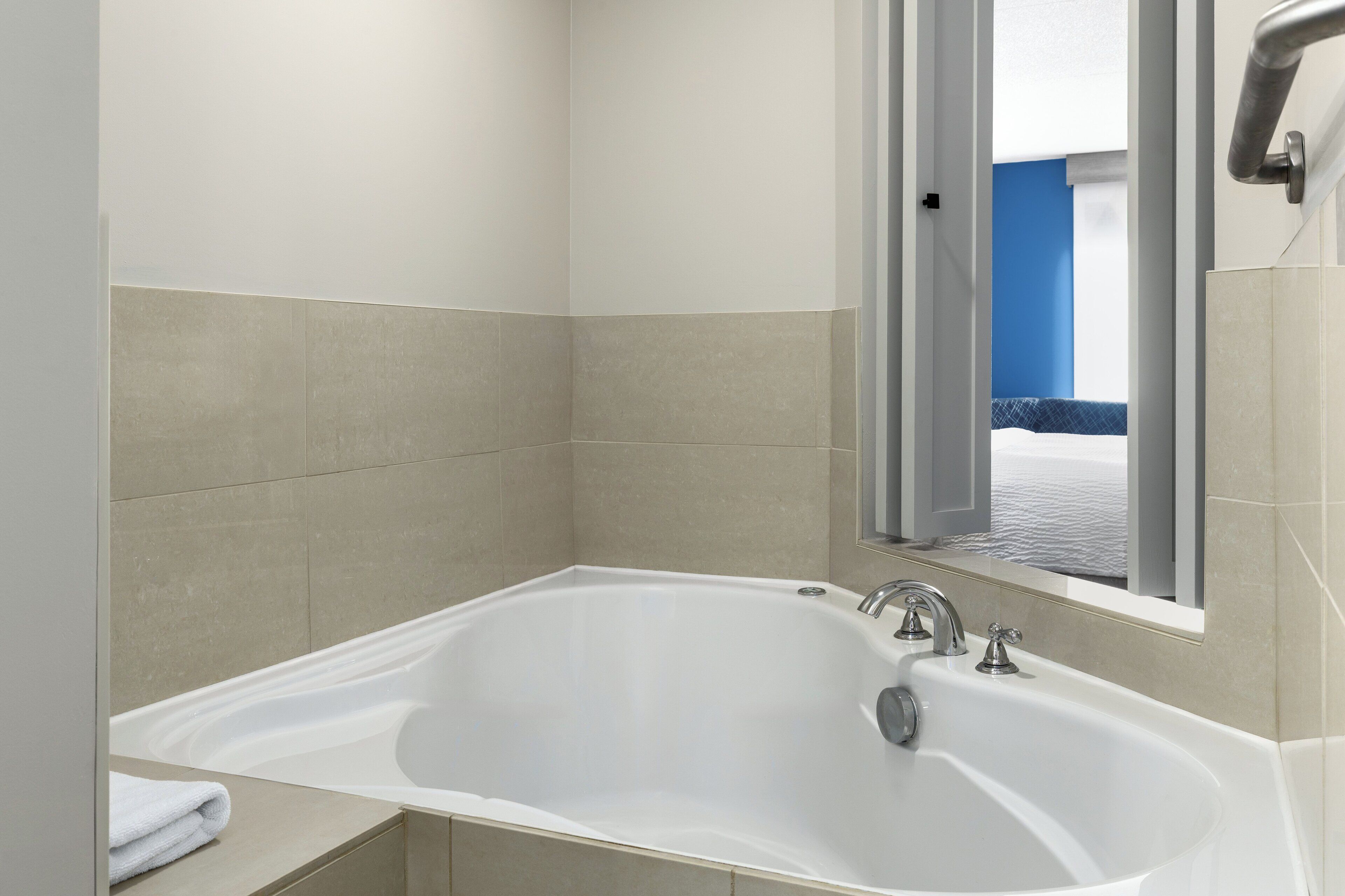suite, 1 king bed, accessible bathtub, jetted tub | 1 bedroom, desk, iron/ironing board, free wifi