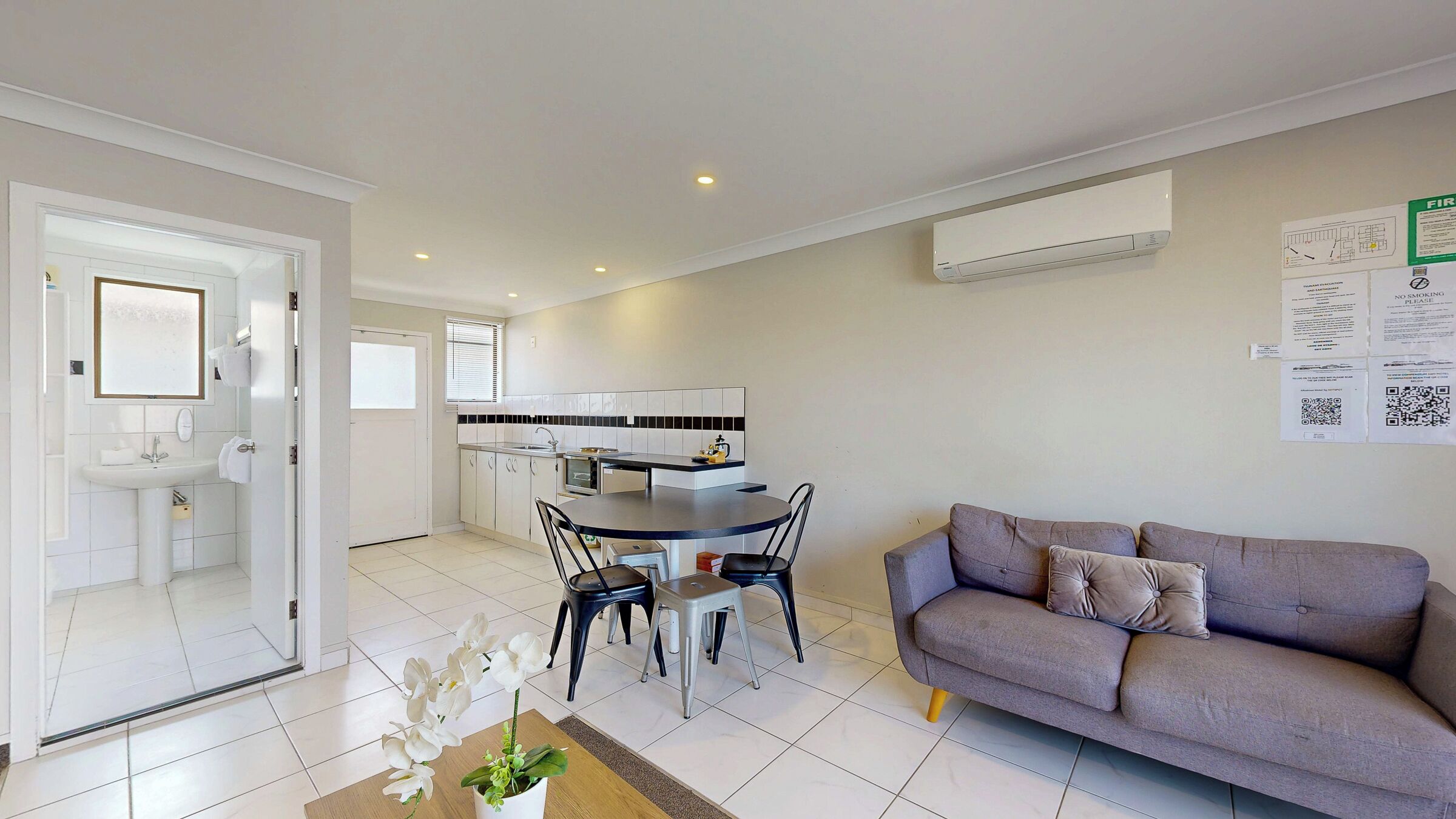 Two Bedroom Apartment | Living area | 32-inch Smart TV with satellite channels, TV