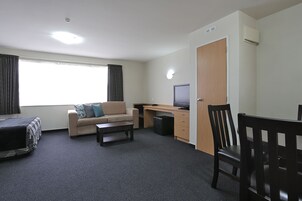 Studio, Kitchen | Living area | 55-inch Smart TV with satellite channels