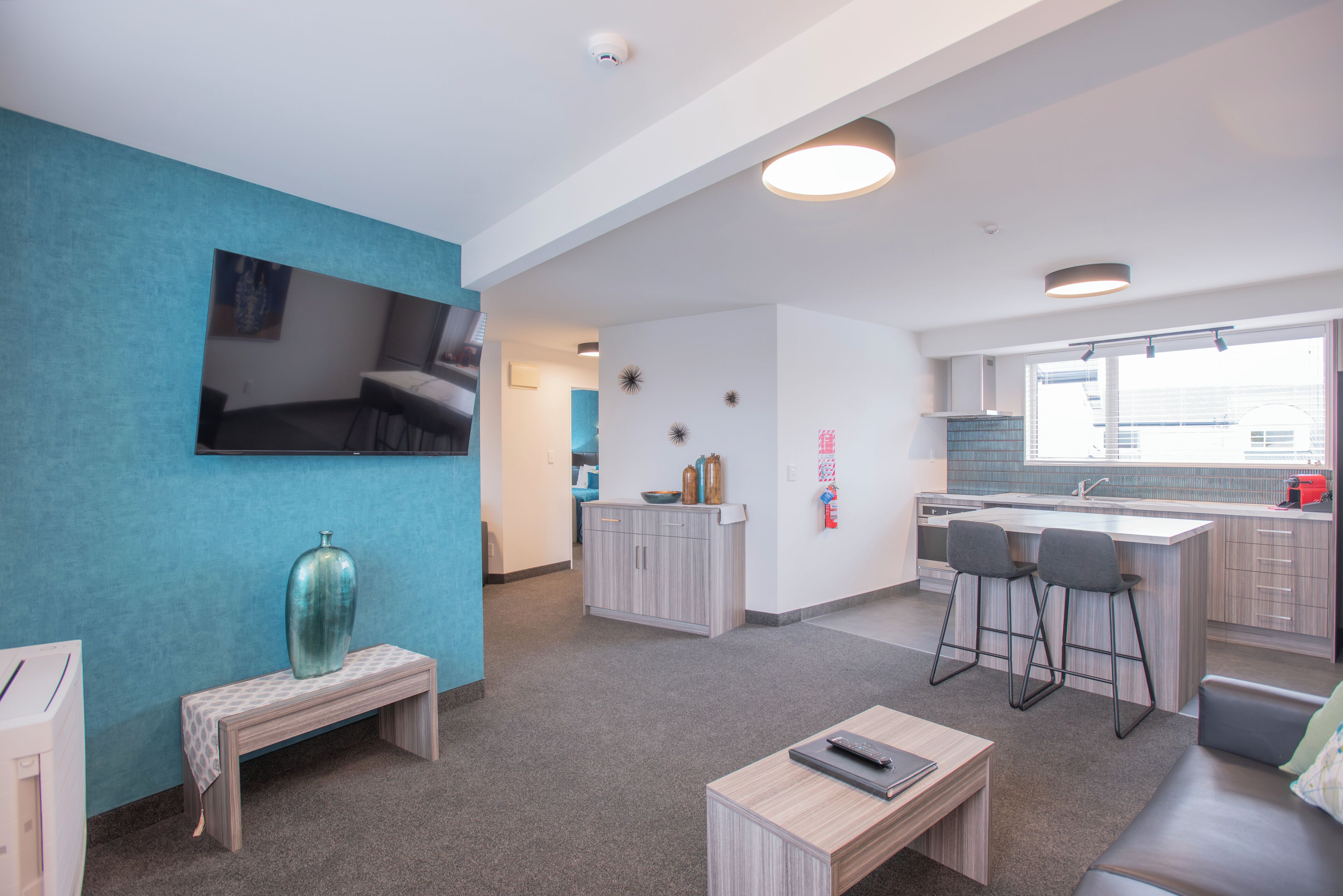 Luxury Suite, 1 Bedroom | Living area | 55-inch Smart TV with satellite channels