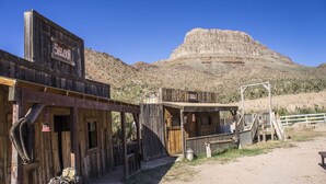 A rustic wooden building with a sign that reads "Salomon's."