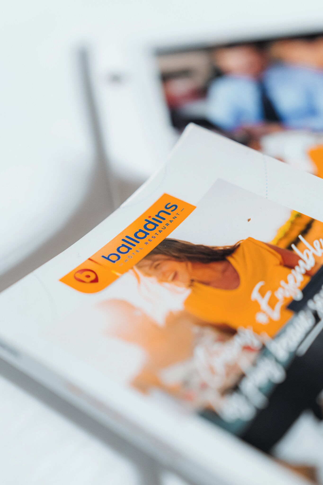 A brochure for Balladins Hotel Restaurant with a visible logo and text.