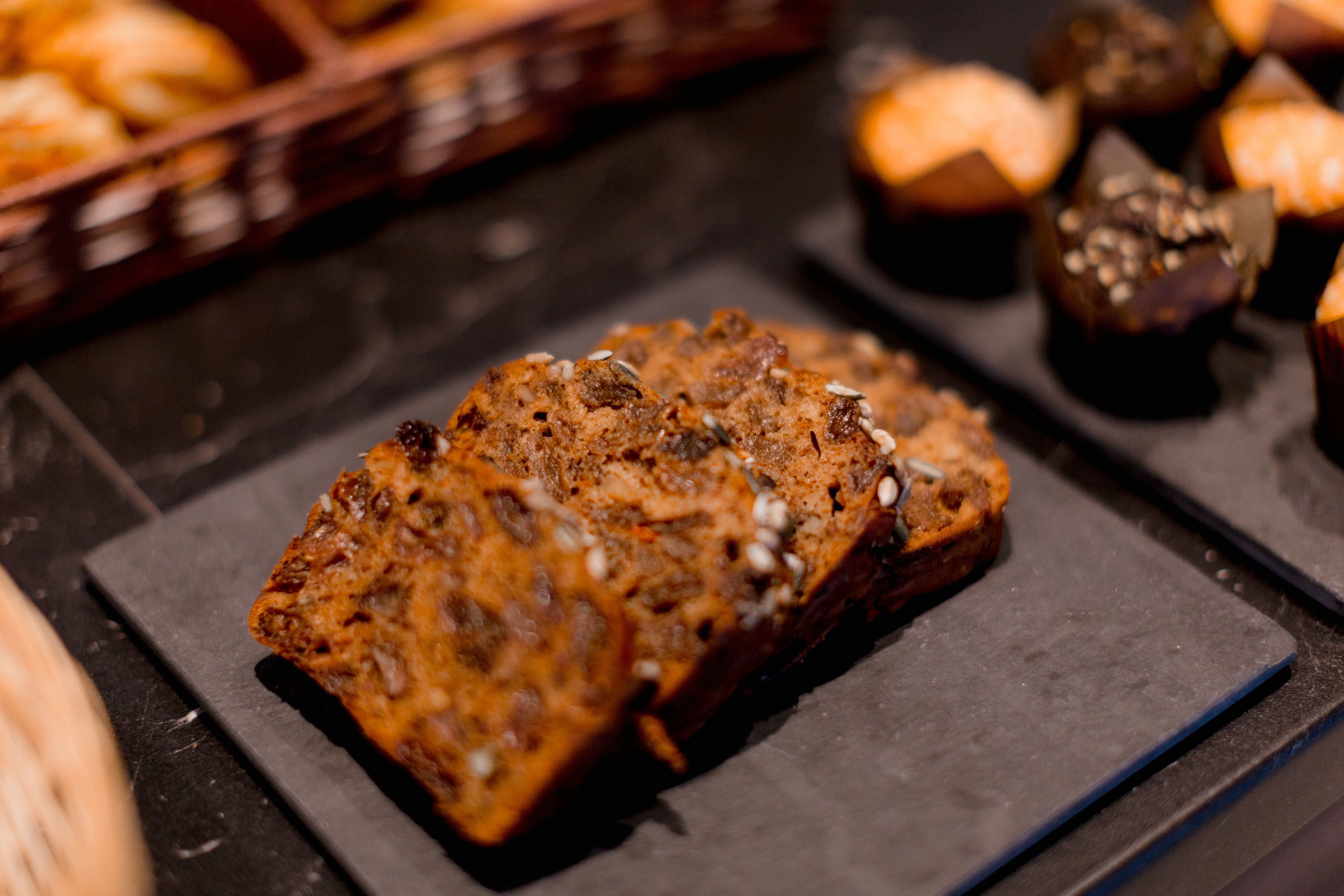 A loaf of bread on a slate board.