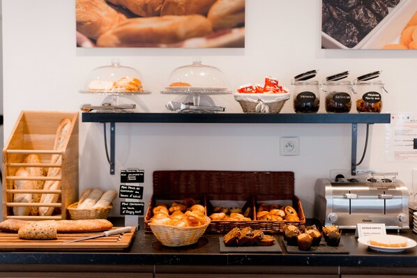 Daily buffet breakfast (EUR 14 per person)