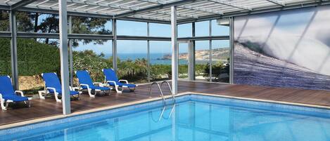 Indoor pool, outdoor pool, pool loungers