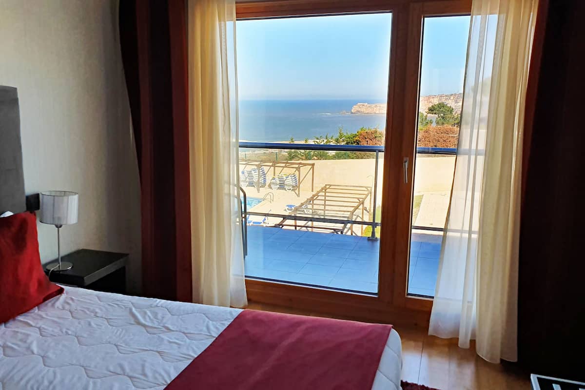 Double or Twin Room, Sea View | 1 bedroom, minibar, in-room safe, desk