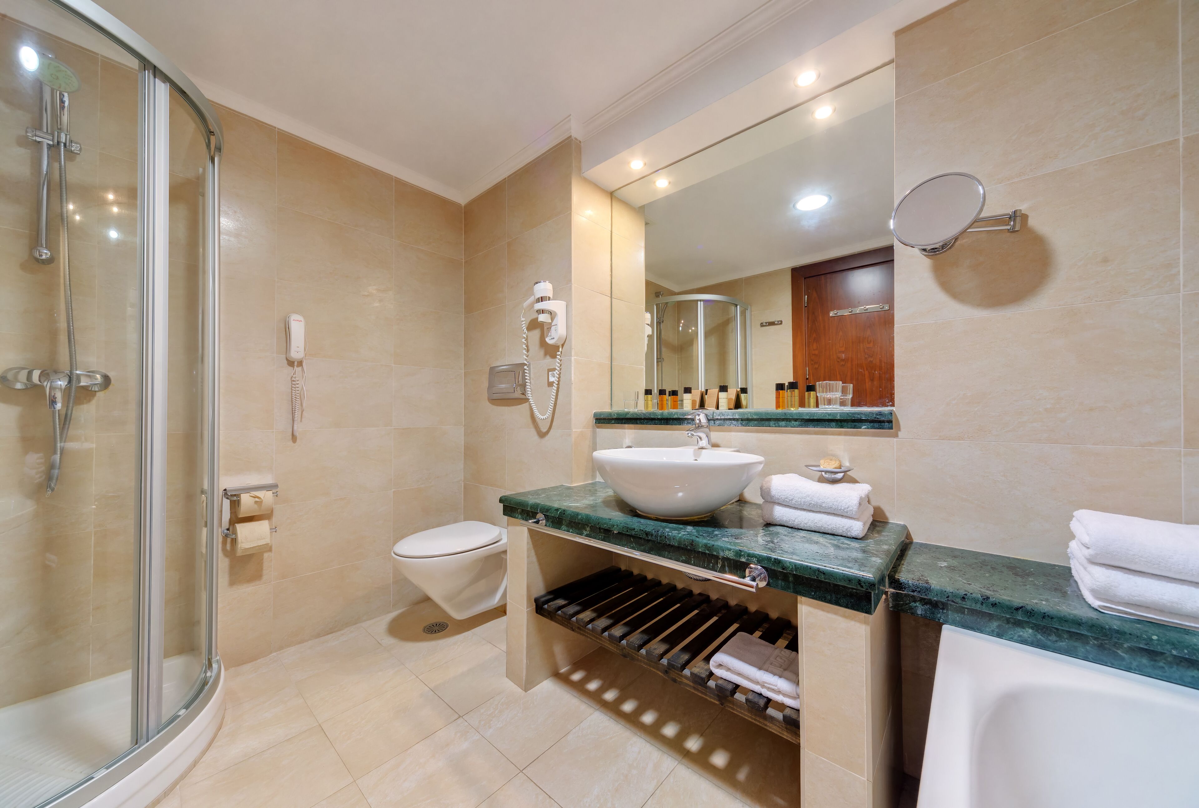 separate bathtub and shower, rainfall showerhead, free toiletries