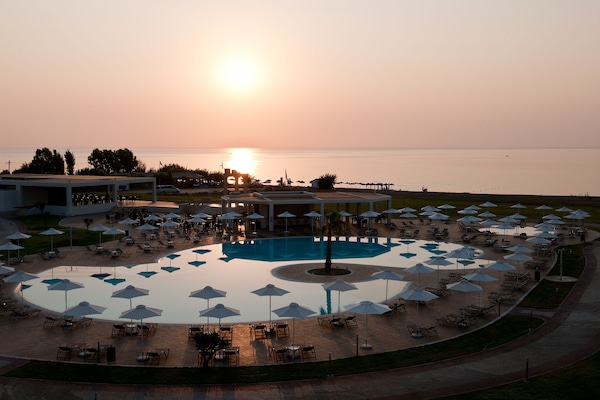 Outdoor pool, open 9:00 AM to 8:00 PM, pool umbrellas, sun loungers