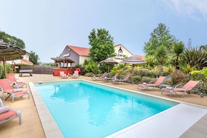 Outdoor pool, pool umbrellas, pool loungers