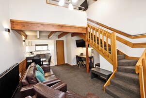 Superior Double or Twin Room | Living area | 50-inch TV with digital channels