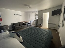 Studio Room | Individually decorated, individually furnished, blackout drapes