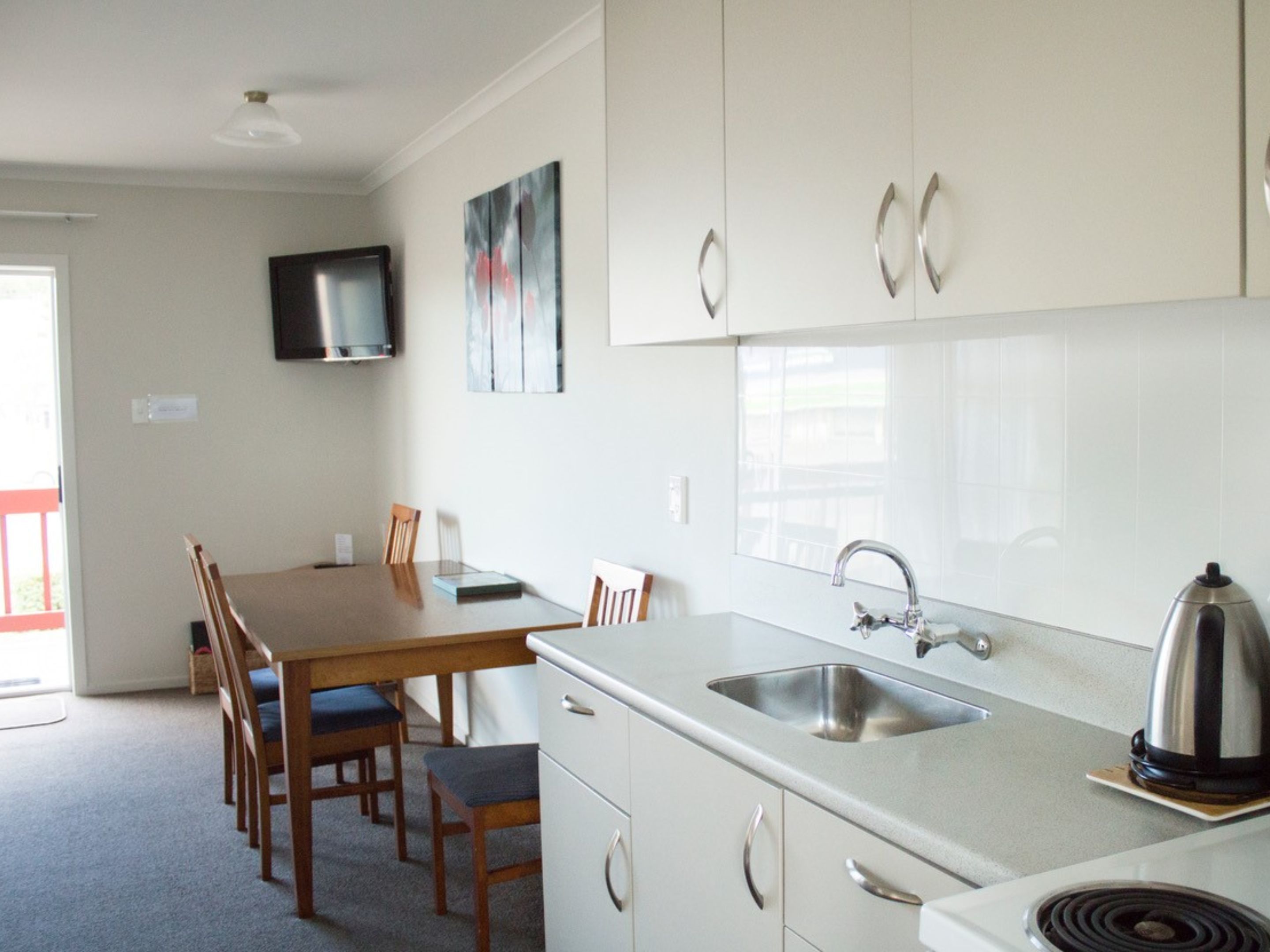 Desk, blackout curtains, soundproofing, iron/ironing board