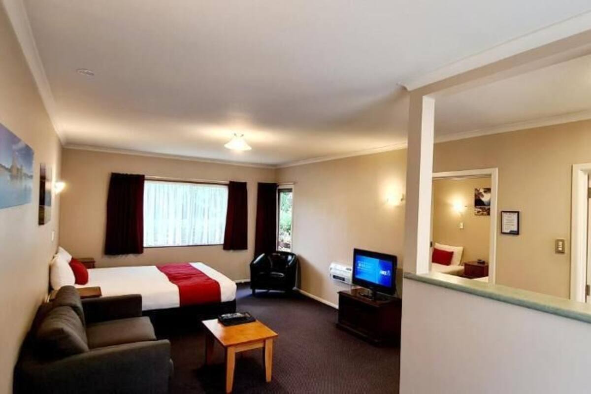 XXX One Bedroom | Iron/ironing board, WiFi (free), bed sheets