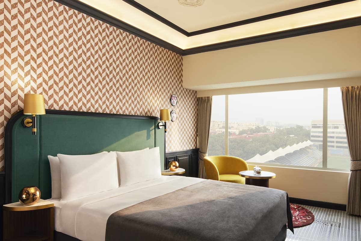 Deluxe Room, King Bed, Stadium View | 1 bedroom, premium bedding, down comforters, pillowtop beds