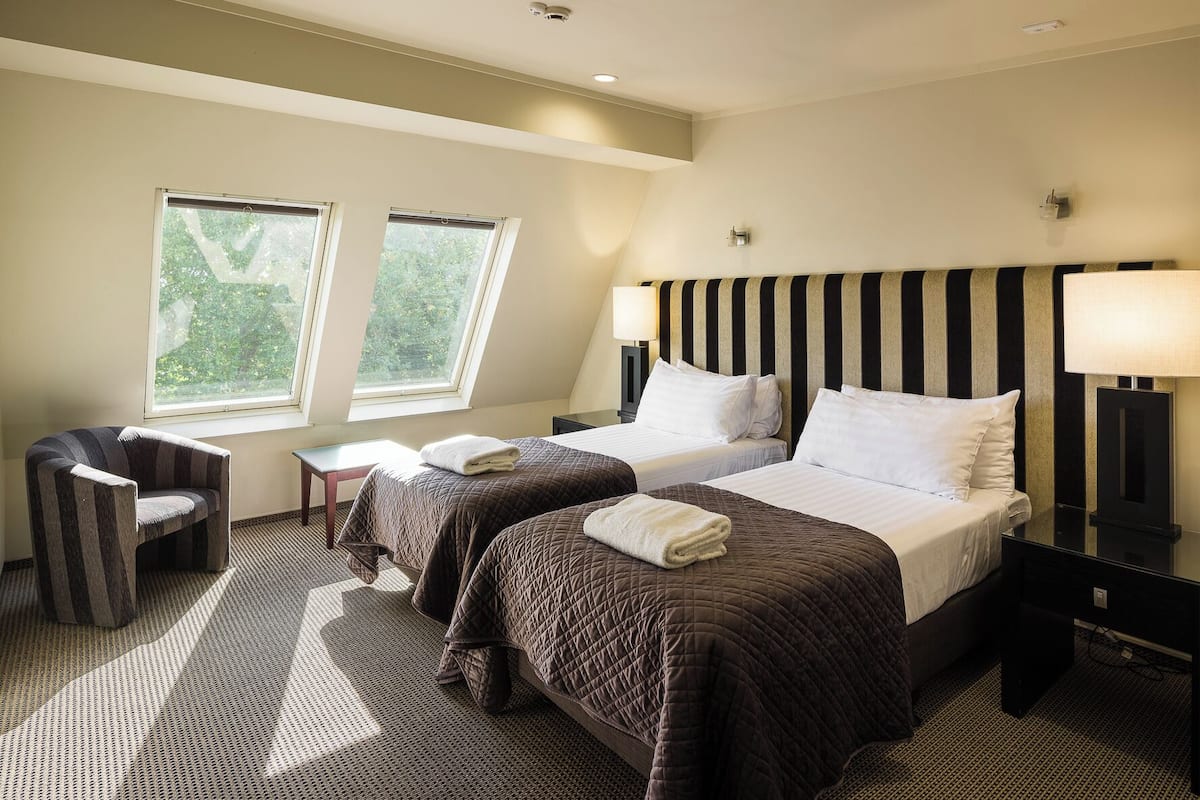 Penthouse, 2 slaapkamers | 2 slaapkamers, luxe beddengoed, een kluis op de kamer, een bureau