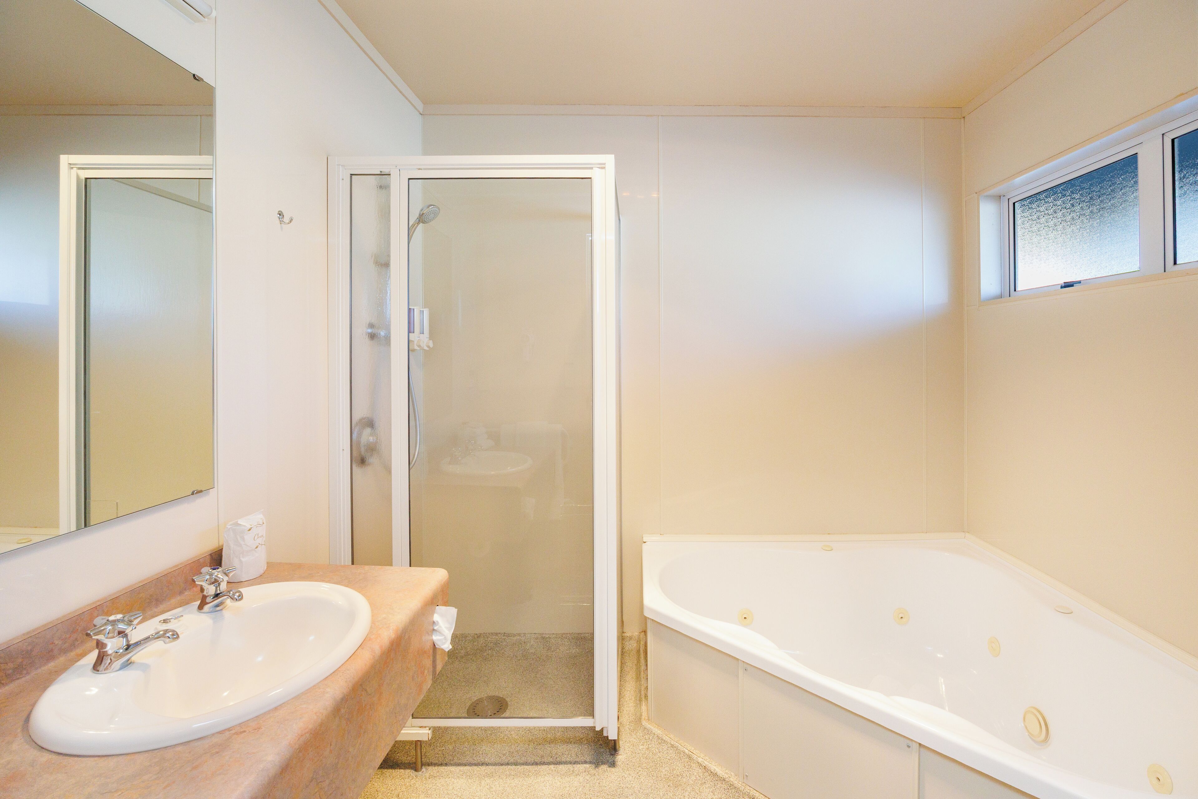 Jetted bath, hair dryer, towels