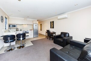 Desk, blackout drapes, soundproofing, iron/ironing board