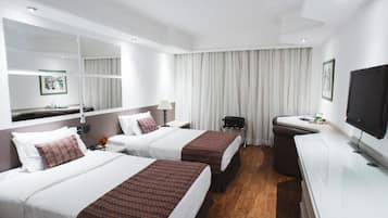 Standard Twin Room | Minibar, in-room safe, desk, blackout drapes