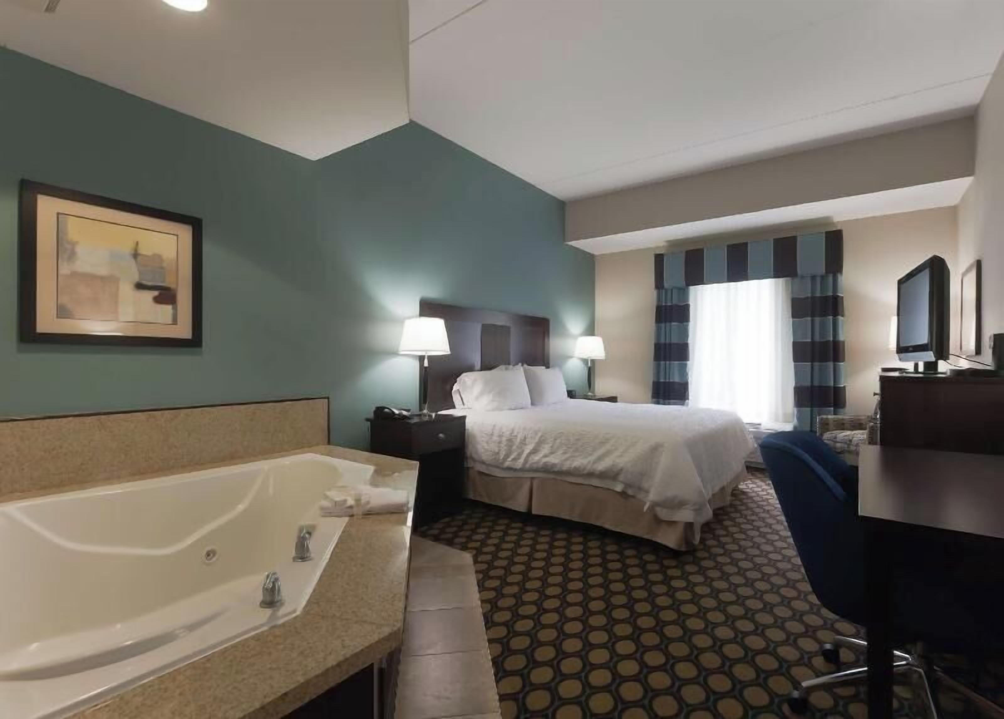 Hypo-allergenic bedding, down comforters, in-room safe, laptop workspace