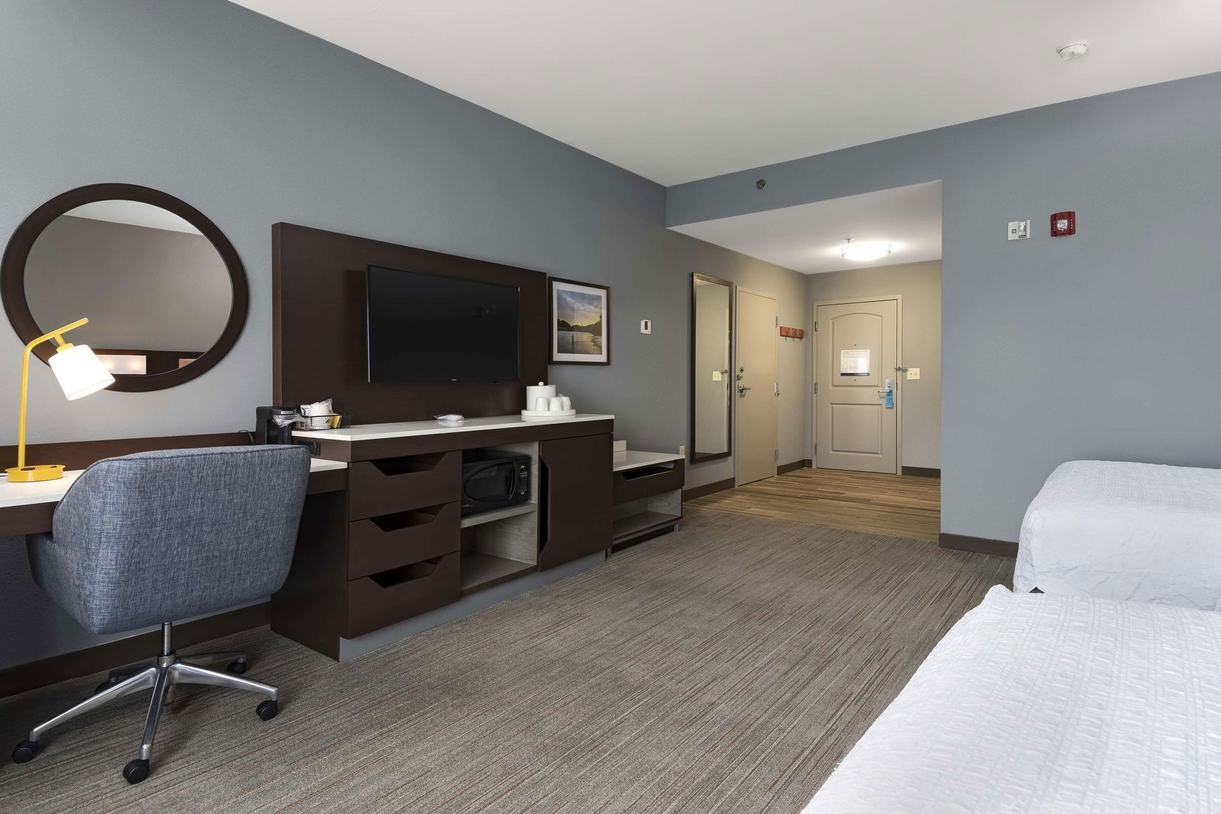 Premium bedding, down comforters, pillowtop beds, in-room safe