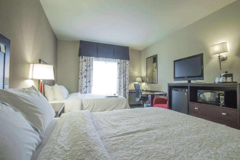 Premium bedding, down comforters, pillowtop beds, in-room safe