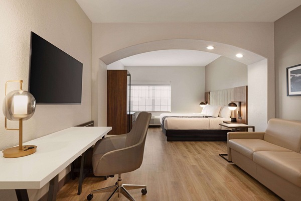 Habitación ejecutiva, 1 cama King size | Ropa de cama de alta calidad y escritorio