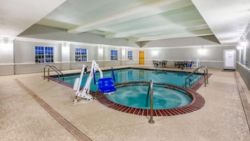 Indoor pool, open 10:00 AM to 10:00 PM, pool loungers