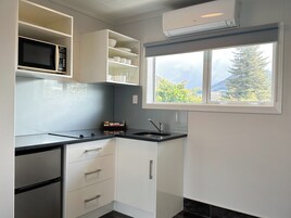 Deluxe Studio | Private kitchenette | Fridge, microwave, stovetop, coffee/tea maker