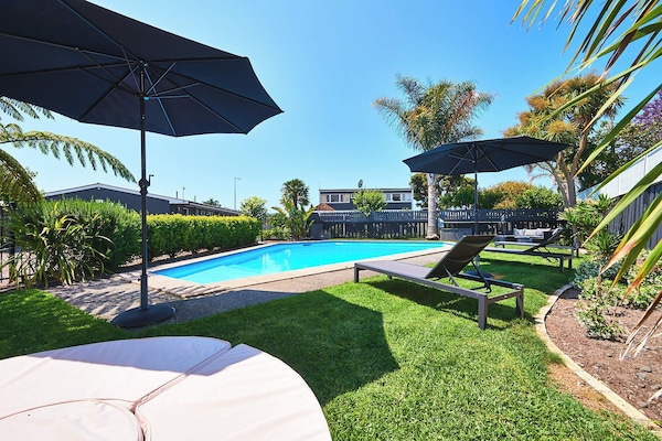 Outdoor pool, open 9:00 AM to 8:00 PM, pool umbrellas, sun loungers