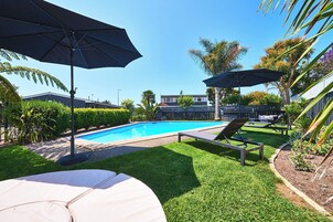 Outdoor pool, open 9:00 AM to 8:00 PM, pool umbrellas, sun loungers