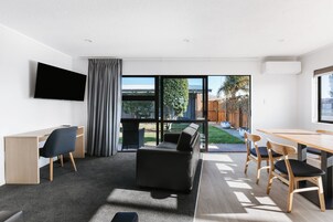 Premium Apartment, 3 Bedrooms | Living area | 50-inch flat-screen TV with digital channels, TV, Netflix