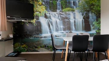 Family Apartment, 2 Bedrooms | Living area | Flat-screen TV, DVD player