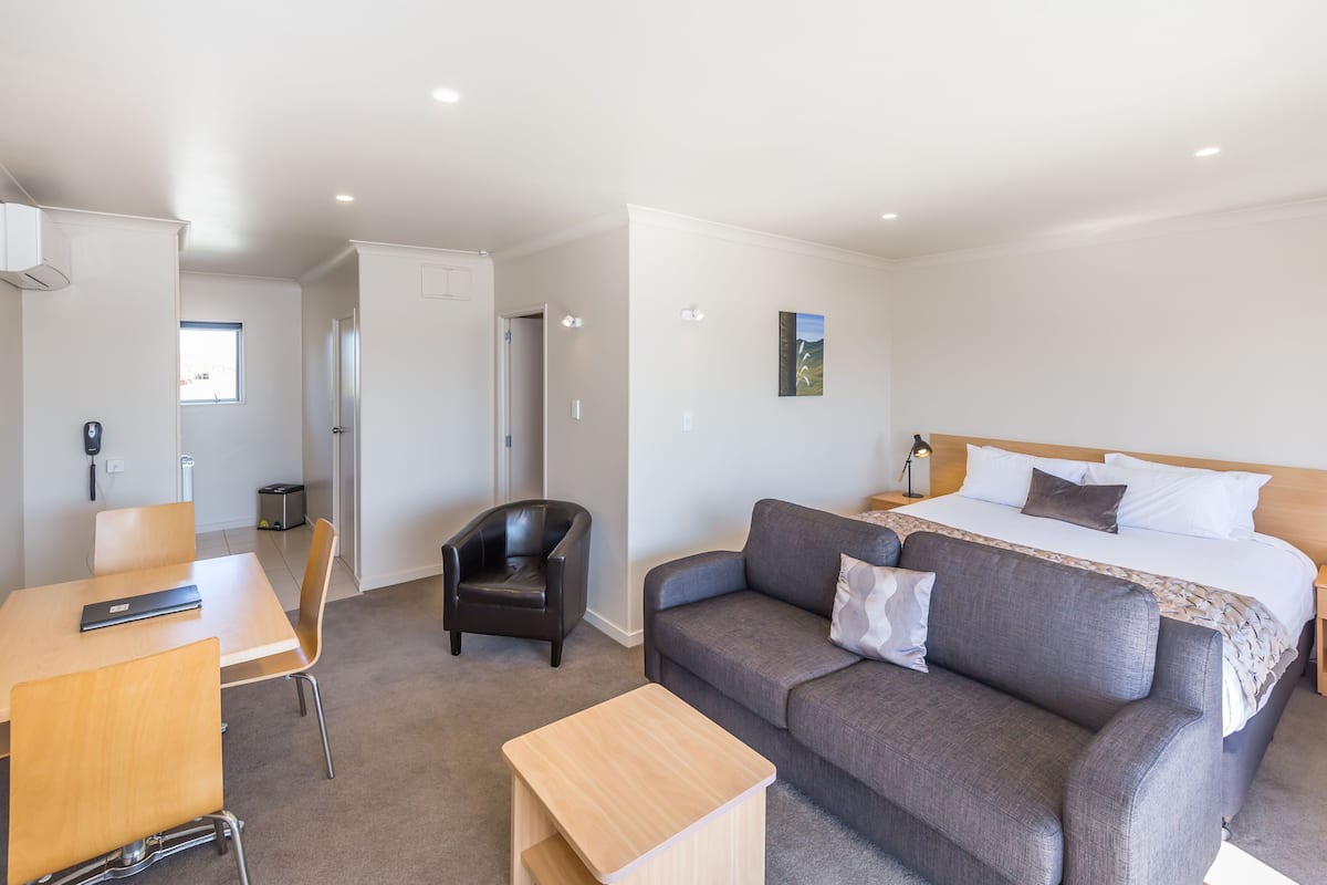 One Bedroom Apartment  | Living area | 50-inch Smart TV with digital channels, TV, toys