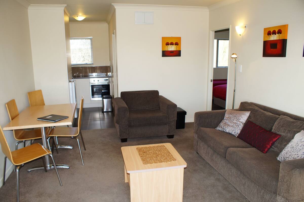 2 Bedroom Apartment | Living area | 50-inch Smart TV with digital channels, TV, toys