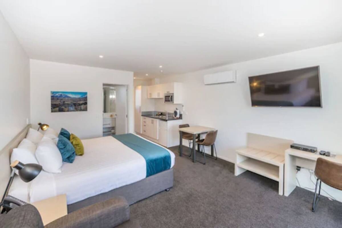 Deluxe Studio Suite, 1 King Bed | Living area | 50-inch Smart TV with digital channels, TV, toys