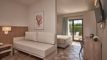 Quarto família, vista para o jardim | Vista do quarto