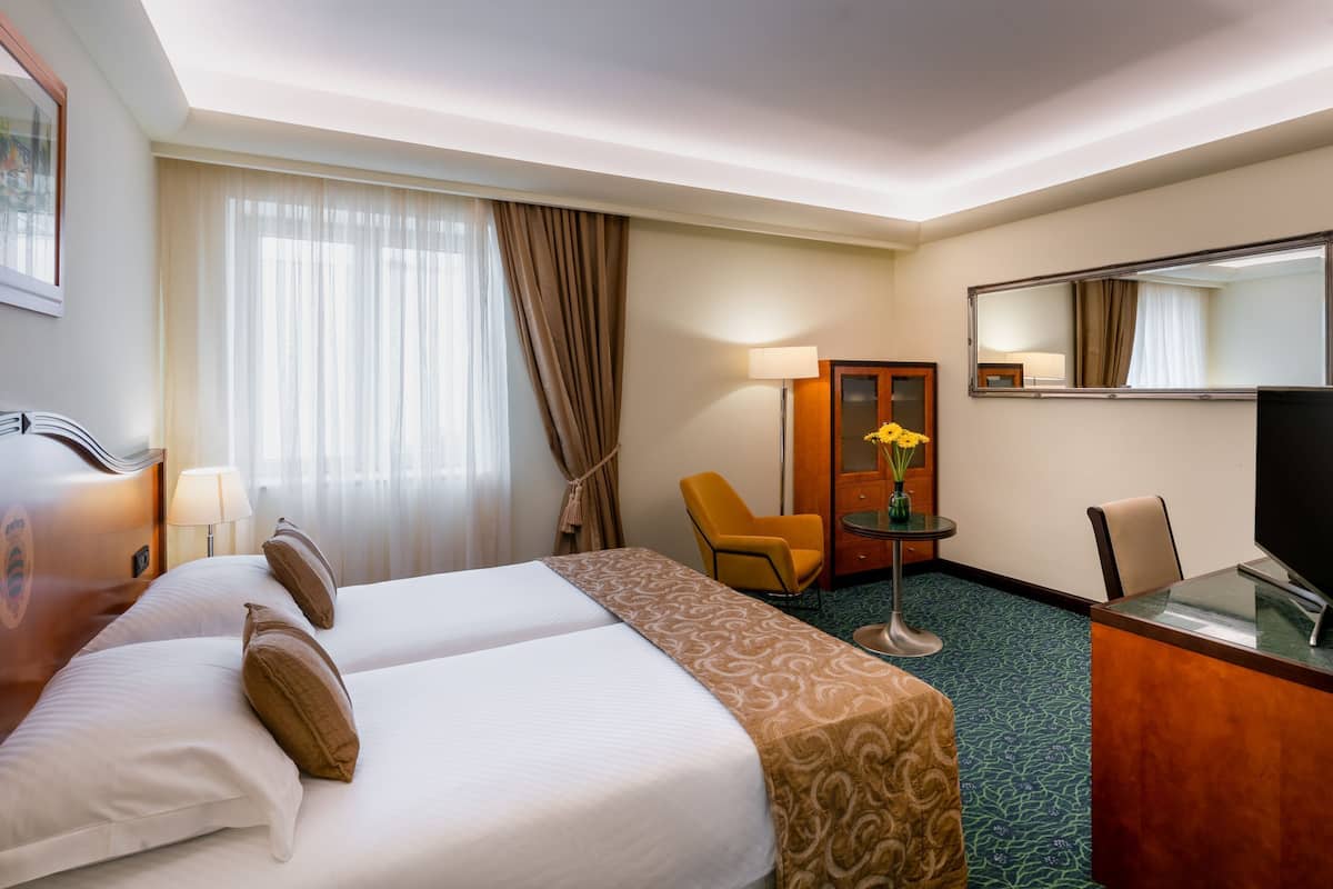 1 habitación, ropa de cama hipoalergénica y minibar