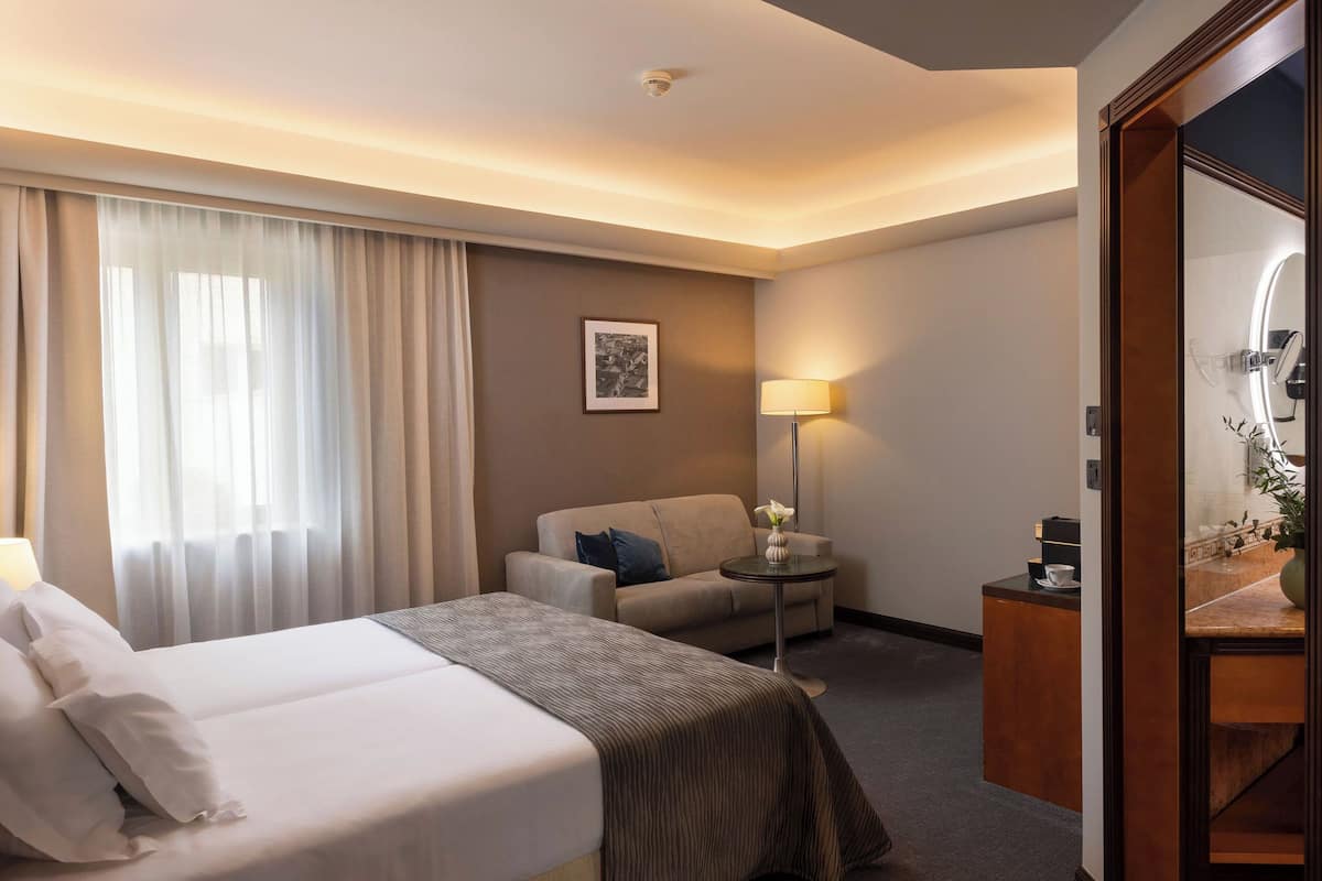 1 habitación, ropa de cama hipoalergénica y minibar