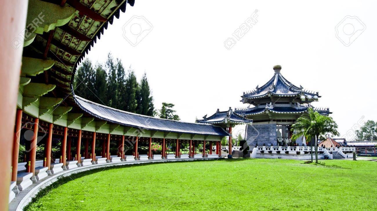 A traditional Chinese pavilion with a curved roof and a central tower.