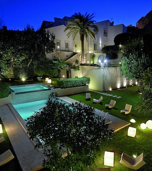 Seasonal outdoor pool, pool loungers