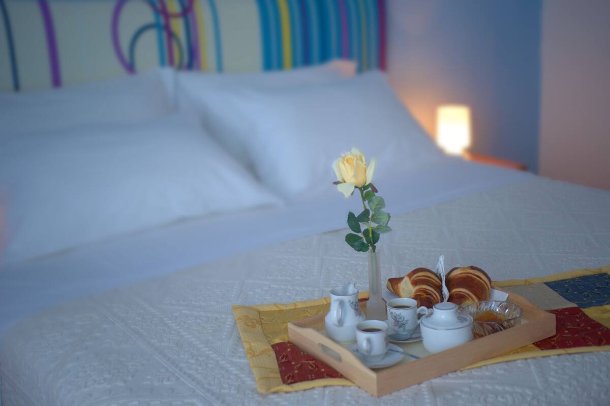 Quadruple Room, Balcony | In-room safe, desk, WiFi (free), bed sheets