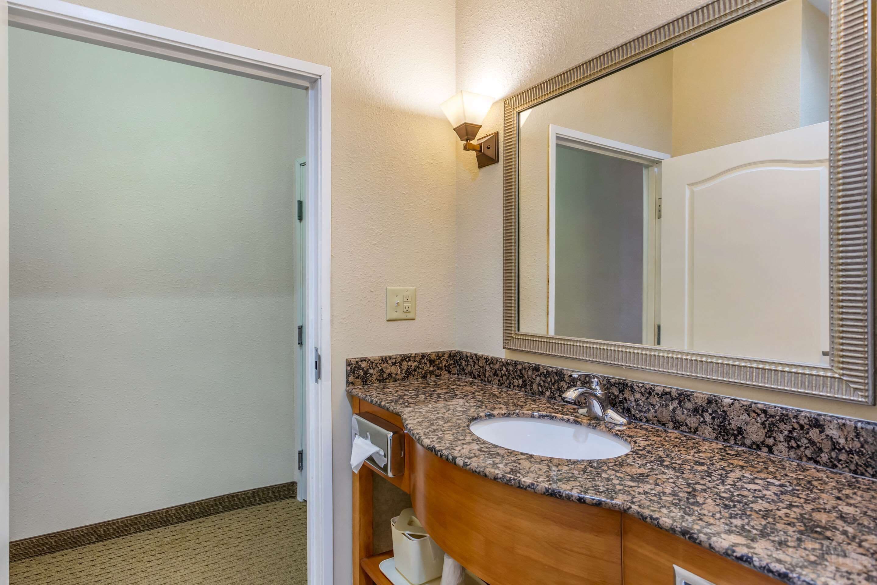 premium bedding, desk, laptop workspace, iron/ironing board