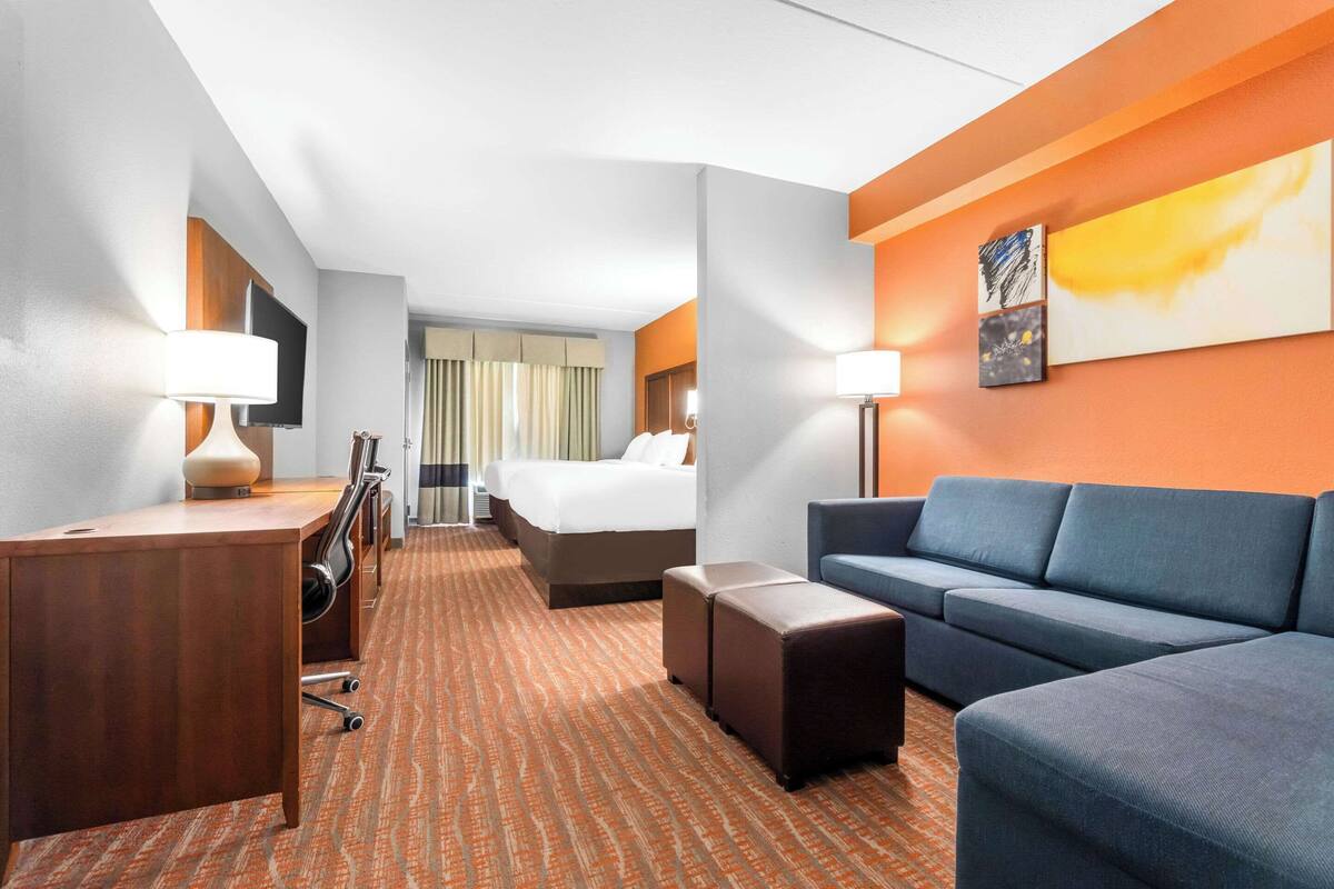 suite, 1 king bed with sofa bed, non smoking | in-room safe, desk, laptop workspace, iron/ironing board