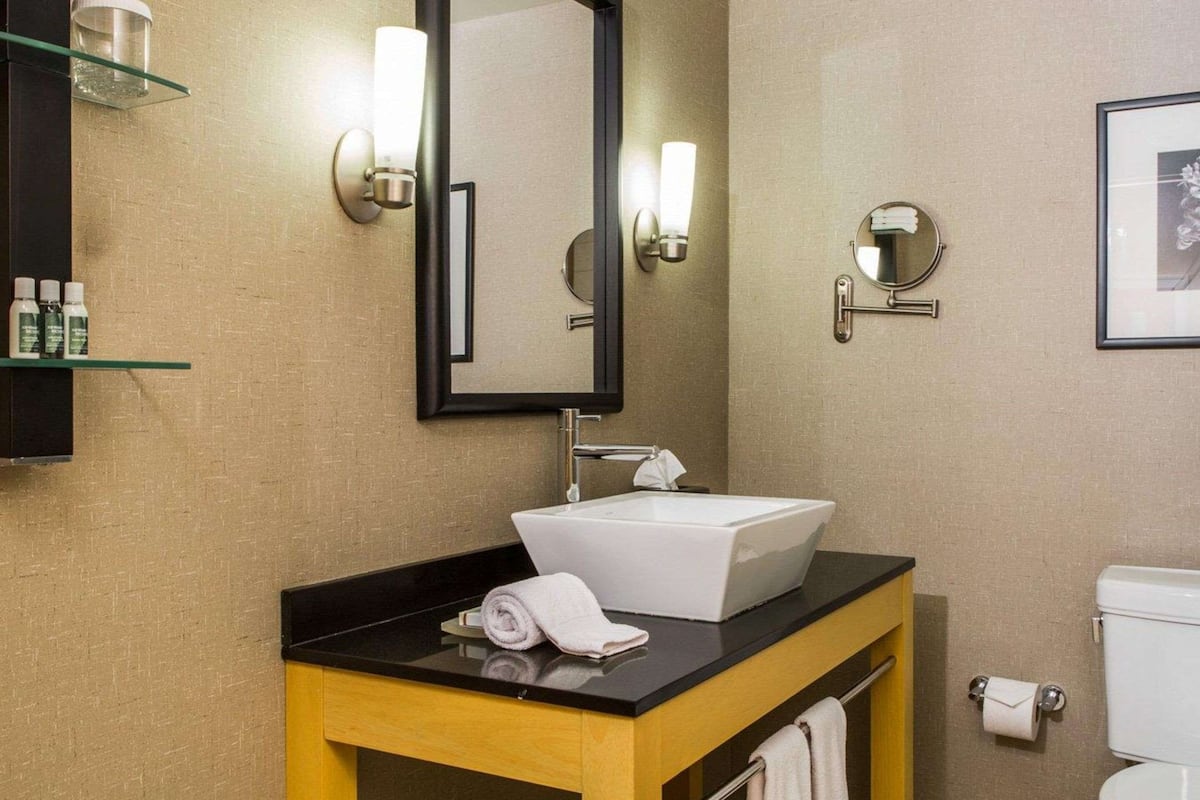 premium bedding, desk, blackout curtains, iron/ironing board